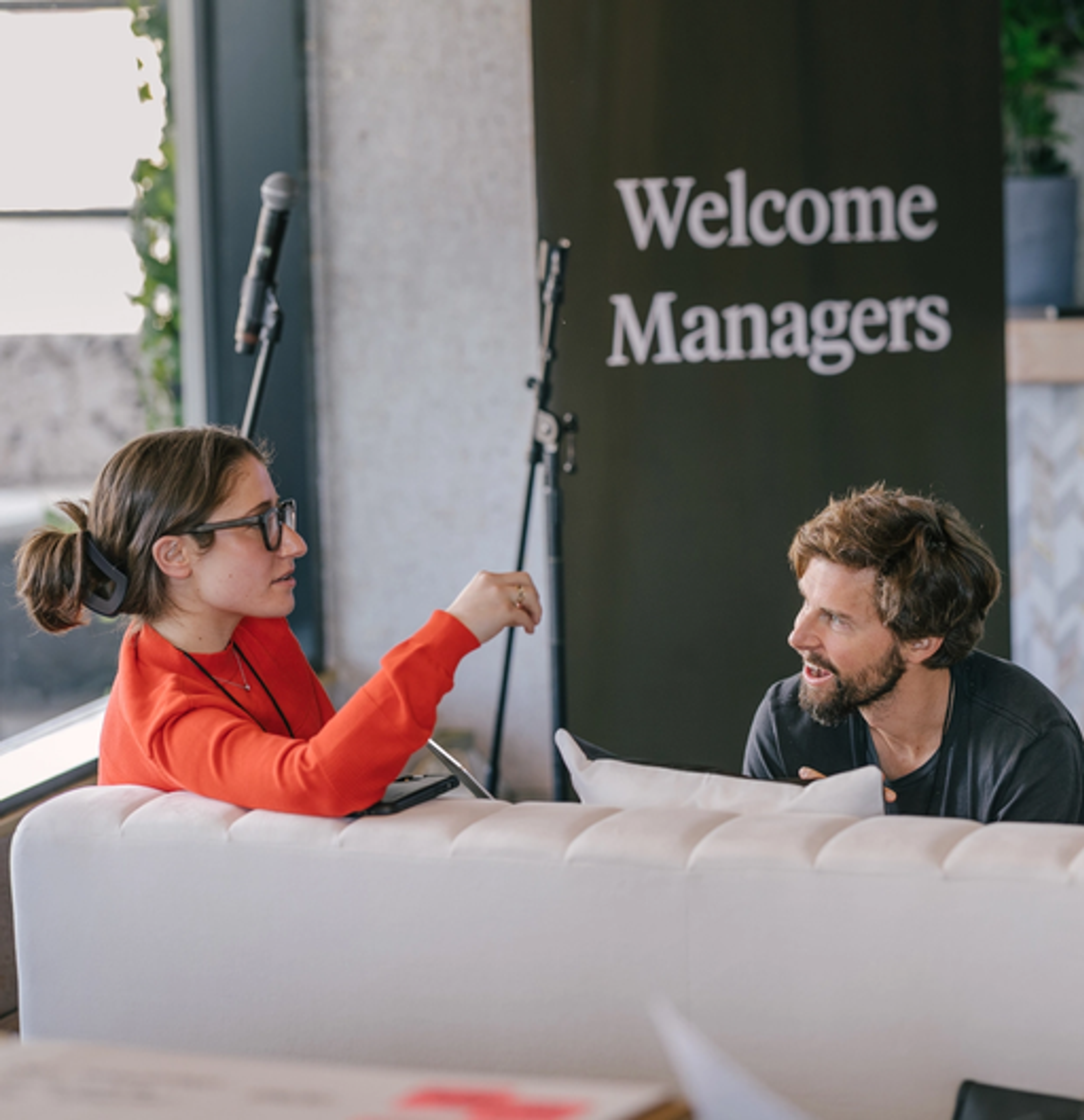 two people in conversation