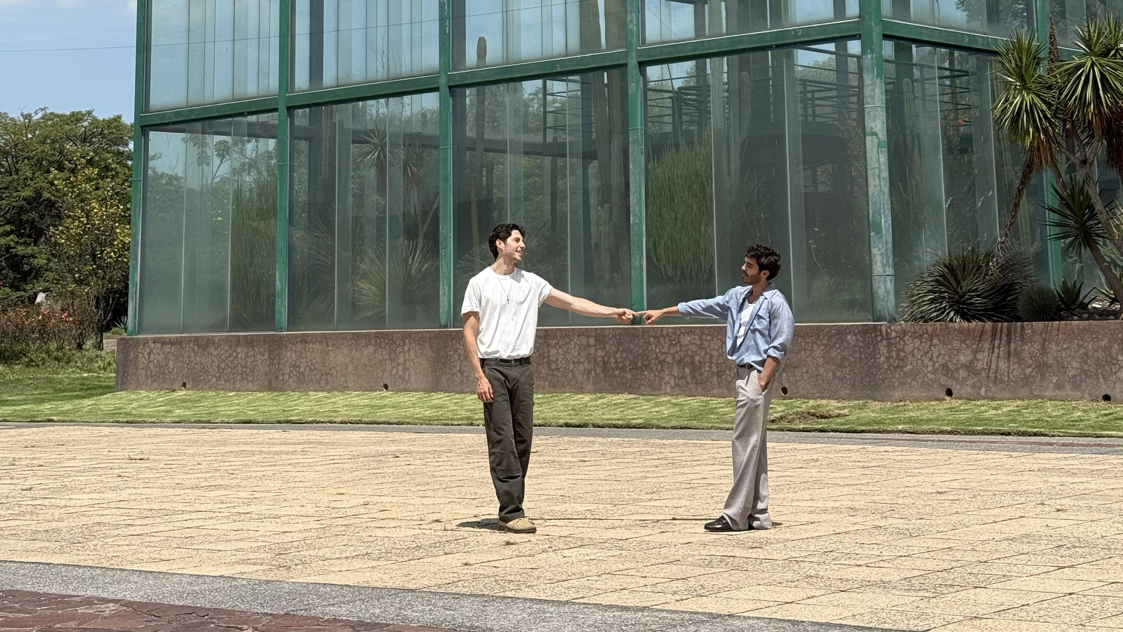 Couple holding hands on a date outside